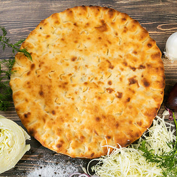 Осетинский пирог с капустой и грецким орехом