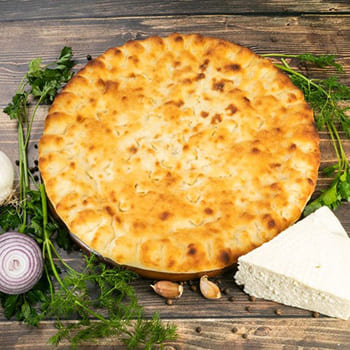 Осетинский пирог с форелью и сыром