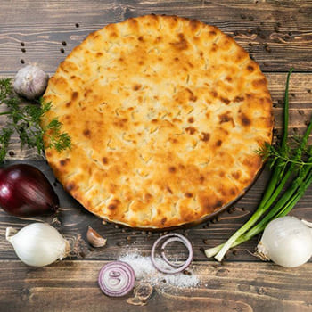 Осетинский пирог с форелью и зеленью