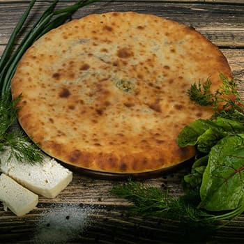 Осетинский пирог с зеленью и сыром